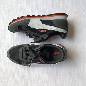 Gray and orange Puma sneakers